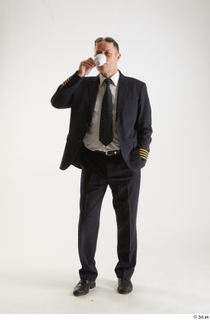 Jake Perry Pilot Drinking Coffee drinking standing whole body 0008.jpg